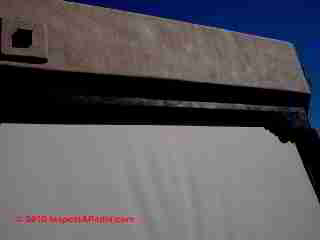 Stucco wall stains after painting (C) Daniel Friedman