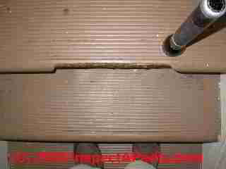 Damaged stair tread nose (C) Daniel Friedman