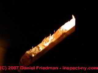 Photograph of surprise leak in basement AHU also may draw flue gases from nearby gas fired equipment