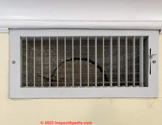 Asbestos-containing popcorn ceiling paing in ductwork and on registers needs attention (C) InspectApedia.com Filby