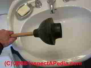 Toilet plunger for clearing blocked drains (C) Daniel Friedman
