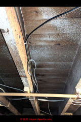 white spots on building framing (C) InspectApedia.com Rebecca