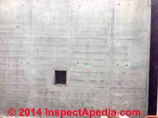 Dark parallel horizontal lines in a newly placed concrete wall (C) InspectAPedia CI
